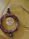 Witch Wreath with Brass Medallion