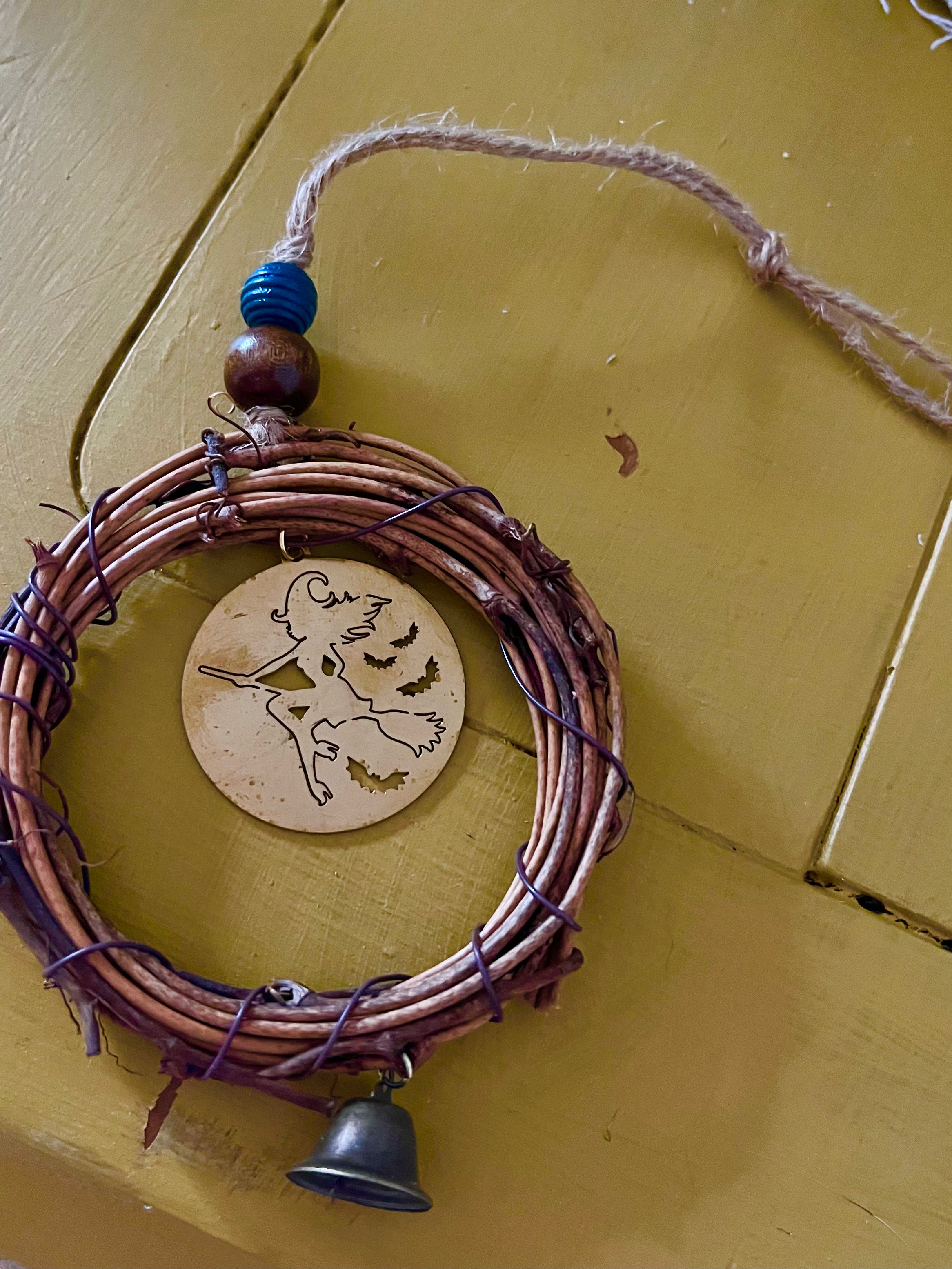 Witch Wreath with Brass Medallion